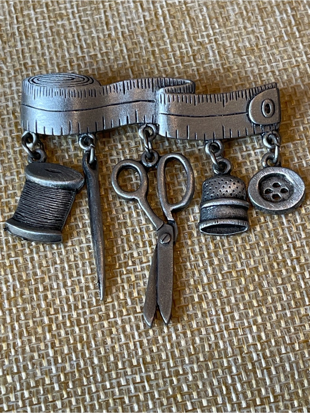 JJ Jonette pewter-tone tape measure sewing brooch